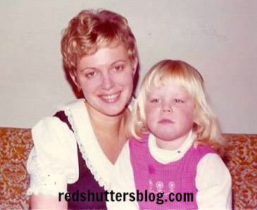 I have so many photos of my mom. I love this one because she looks so beautiful and because I remember the dress she's wearing. Yes, that's me in the photo, too. I'm perhaps about 4 years old and clearly not up for smiling.